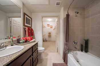 Ceramic tile flooring in bathroom areas